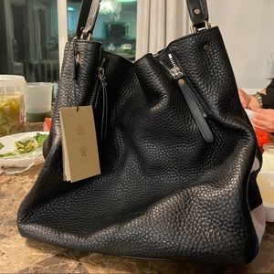 Authentic Burberry leather canvas, Brand New